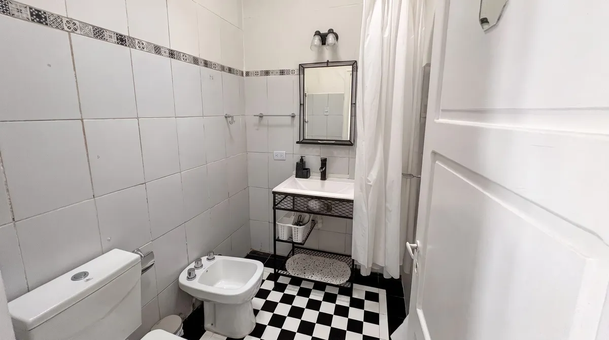 Bathroom with shower, bidet and vanity