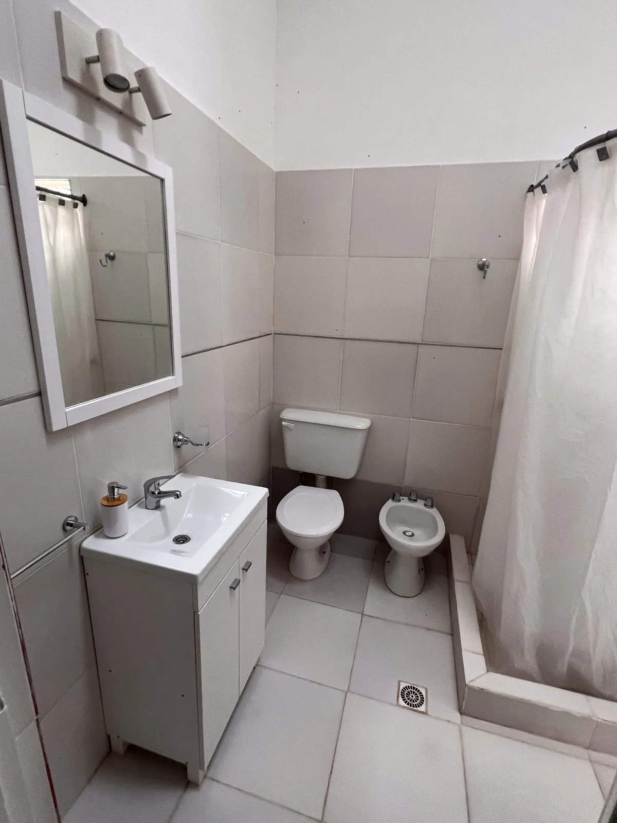 The bathroom, full with shower