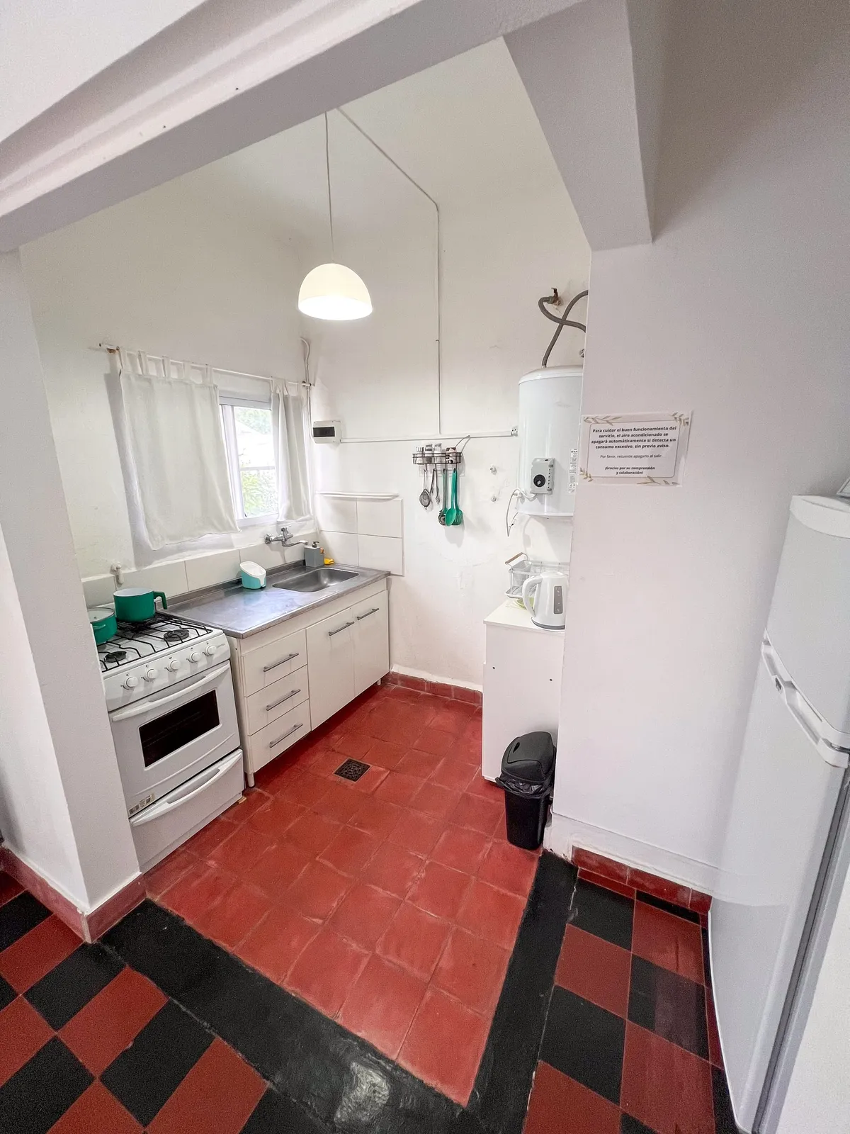 Separate kitchen with a gas oven