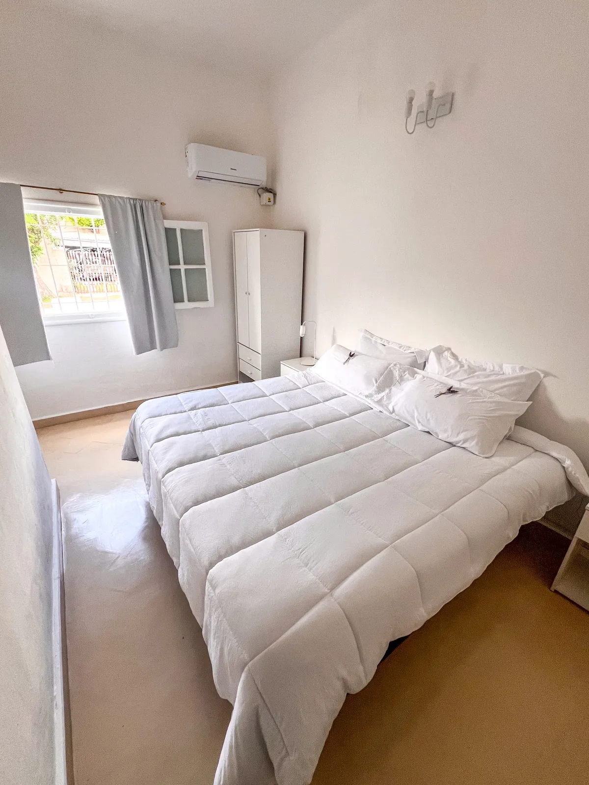 Bedroom with a king bed (it splits into two singles)